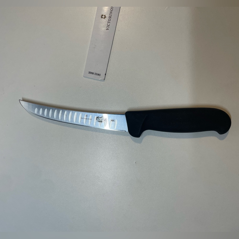 Victorinox 6" Granton Edge Wide Stiff Curved Boning Knife 5.6523.15